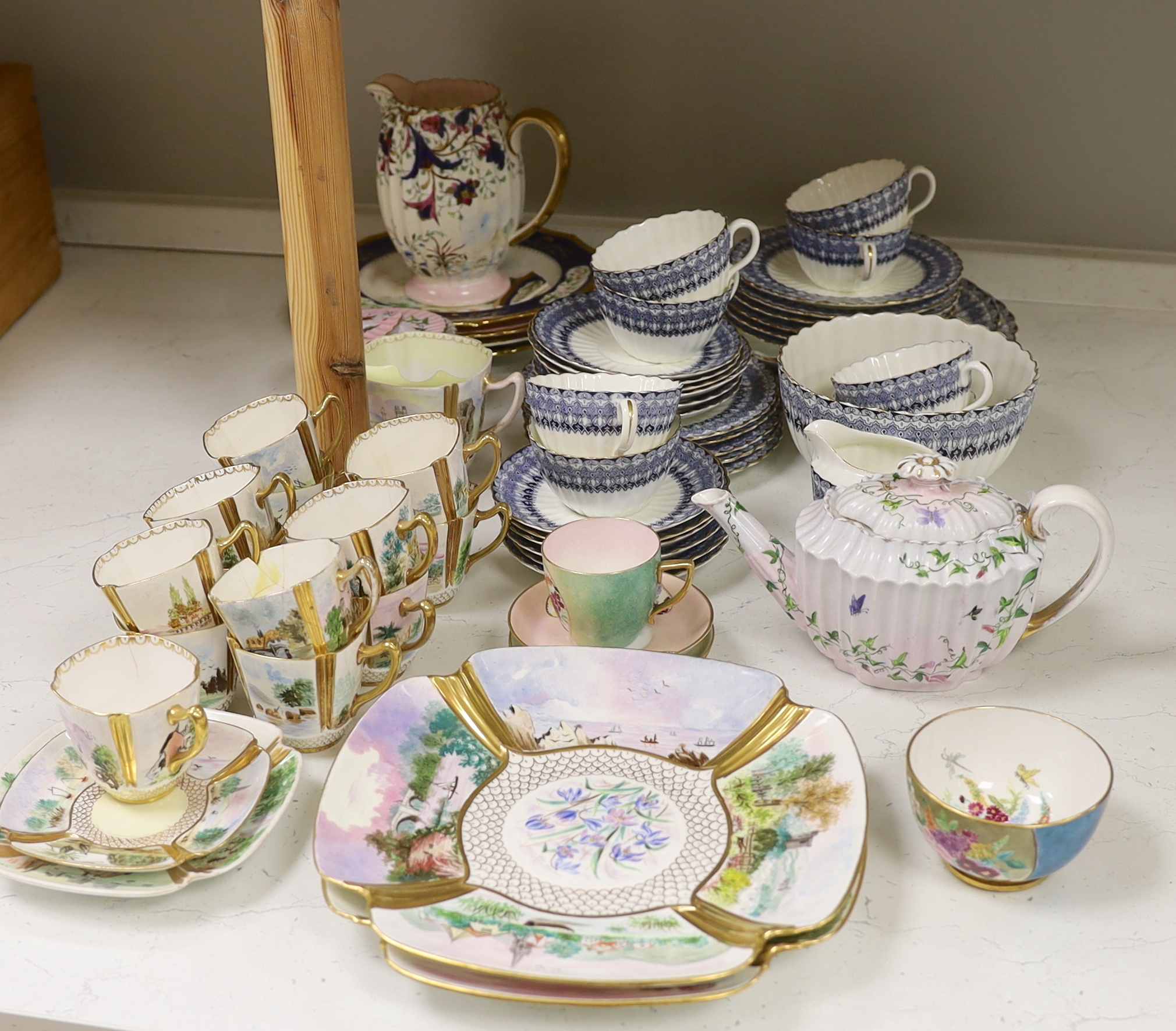 A Copeland Spode porcelain part tea set and two dishes, painted with scenes after Birkett Foster, a blue and white teaset and other teaware, Copeland Spode dishes 25cm wide